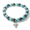 Palais du Rosaire Bracelet en pierres naturelles d'Hématite et Turquoise avec croix^ Bracelet Fantaisie